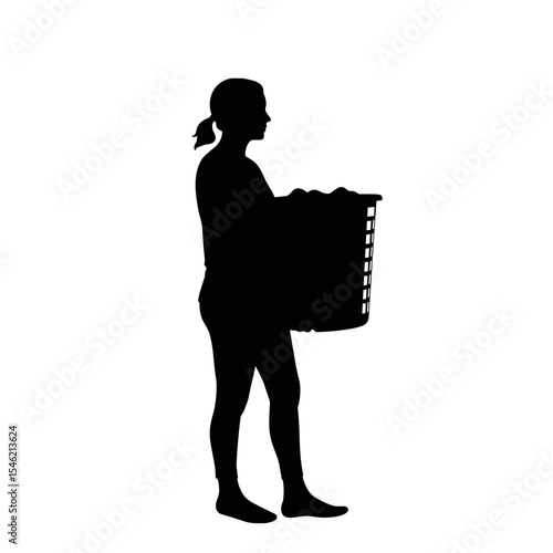 Woman carrying laundry basket in silhouette at home and life  