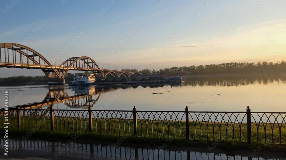 custom made wallpaper toronto digitalRussia Rybinsk 05 20 2025 A cargo barge passed under the bridge on the Volga River early in the morning at dawn.