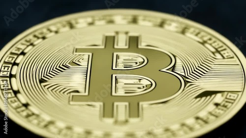 Golden bitcoin on a black background. Bitcoin cryptocurrency. Investing in crypto assets. rotation animation