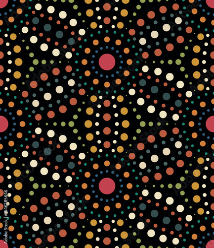 Seamless abstract floral pattern with dotted geometric flowers in orange, green, and blue on a black background. Dot art with small multicolor circles. Decorative vector illustration.
