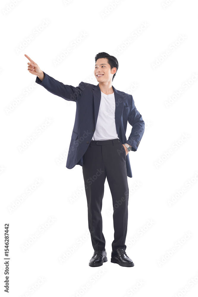 Full-body seated portrait of Asian businessman scrolling through phone, serious expression Full-body seated portrait of Asian businessman scrolling through phone, serious expression