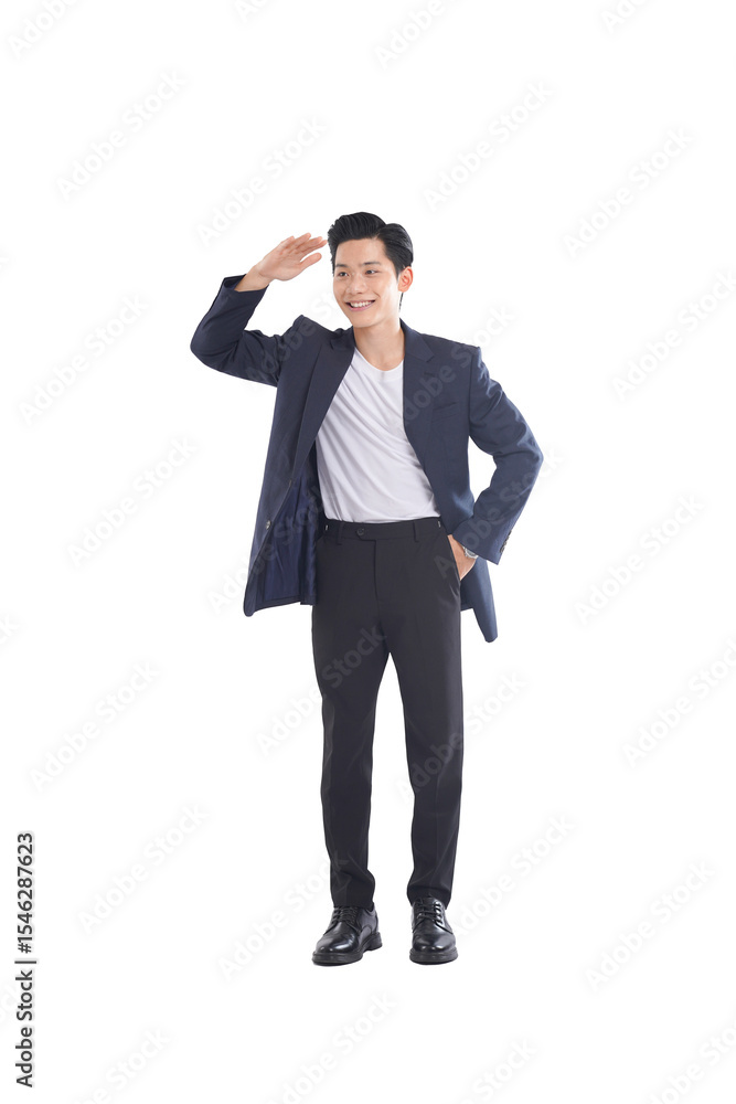 Full-body seated portrait of Asian businessman working on laptop while seated, neutral expression Full-body seated portrait of Asian businessman working on laptop while seated, neutral expression