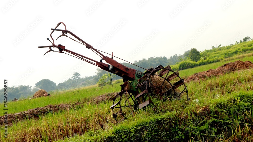 Fototapeta premium Old Tractor in Field
