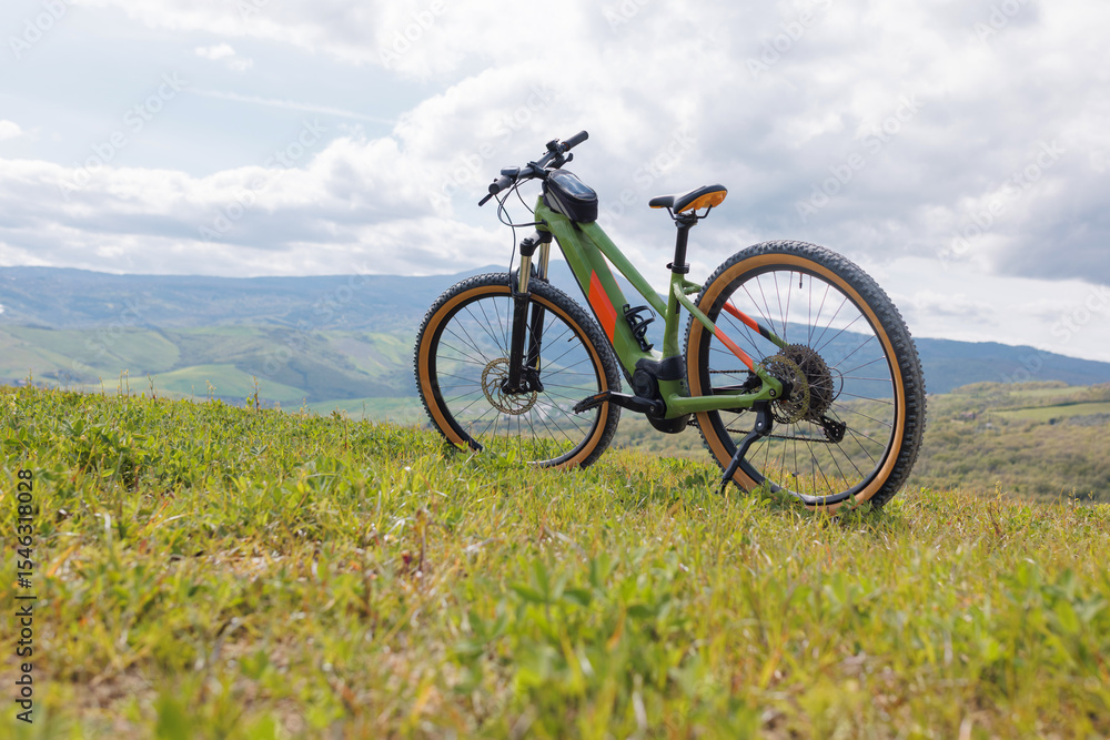 Explore the stunning landscape of Tuscany while mountain biking on a sunny day. The rolling hills and vibrant greenery provide a perfect backdrop for an outdoor adventure. Explore the stunning landscape of Tuscany while mountain biking on a sunny day. The rolling hills and vibrant greenery provide a perfect backdrop for an outdoor adventure.