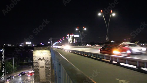 heavy traffic at night on the bridge over the Sava River in Belgrade