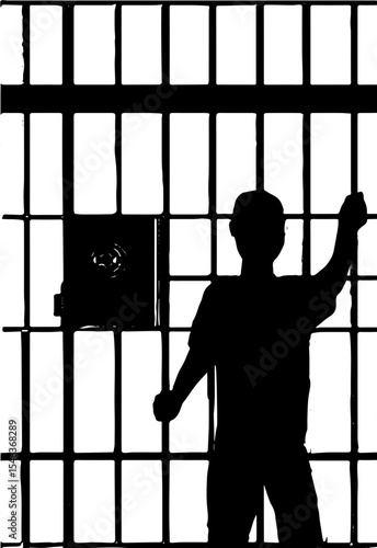 silhouette of a man behind bars