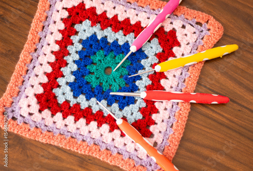 Hooks and threads for crocheting. Hobbies, creativity and handicrafts. Home leisure. Photo view from above