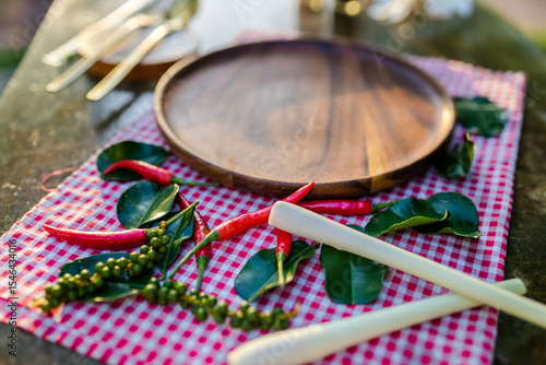 hai-cooking-herbs-wooden-plate-flatlay