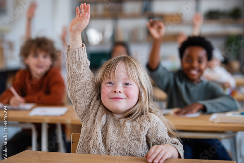 incusive classroom with a kid with special needs in the center raising the hand