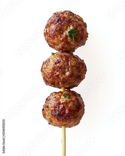 Grilled meatballs on skewer, Thai grilled meatballs with caramelized glaze, grilled meatballs on white background for spicy snack menu, street food branding or Asian delivery