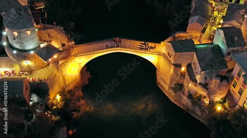 Aerial view on the Old Bridge in Mostar at night, Bosnia and Herzegovina, 4k