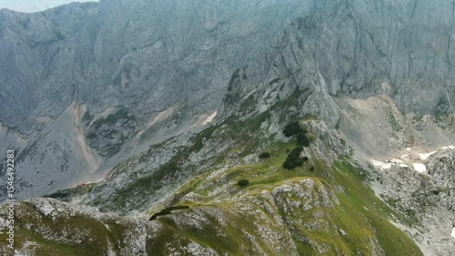 Flying in Durmitor mountains. Durmitor National park in Montenegro. Beautiful aerial mountain landscape, 4k