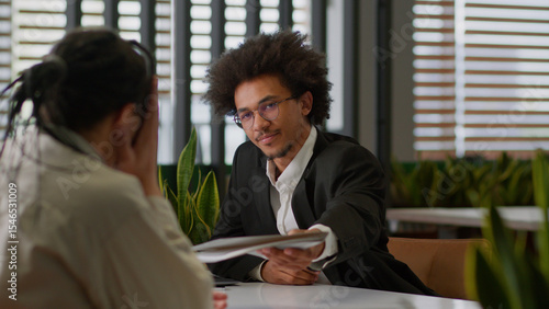 Photos Two businessmen in business office African American leader insurance bank agent
