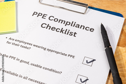 PPE Compliance Checklist Document with Pen on Desk – Workplace Safety and Equipment Regulation Concept