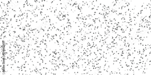 Abstract background pattern of small mosaic fragments in various shades of gray creating a seamless texture for design and decor