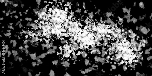 Snowflakes on dark background. white icy snowflakes isolated on black background, natural background. white crystalline powder on a black background. sugar dust. texture, pattern and clipping.