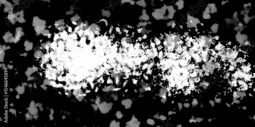 Snowflakes on dark background. white icy snowflakes isolated on black background, natural background. white crystalline powder on a black background. sugar dust. texture, pattern and clipping.