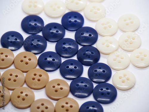 Colorful Sewing Buttons on White Background