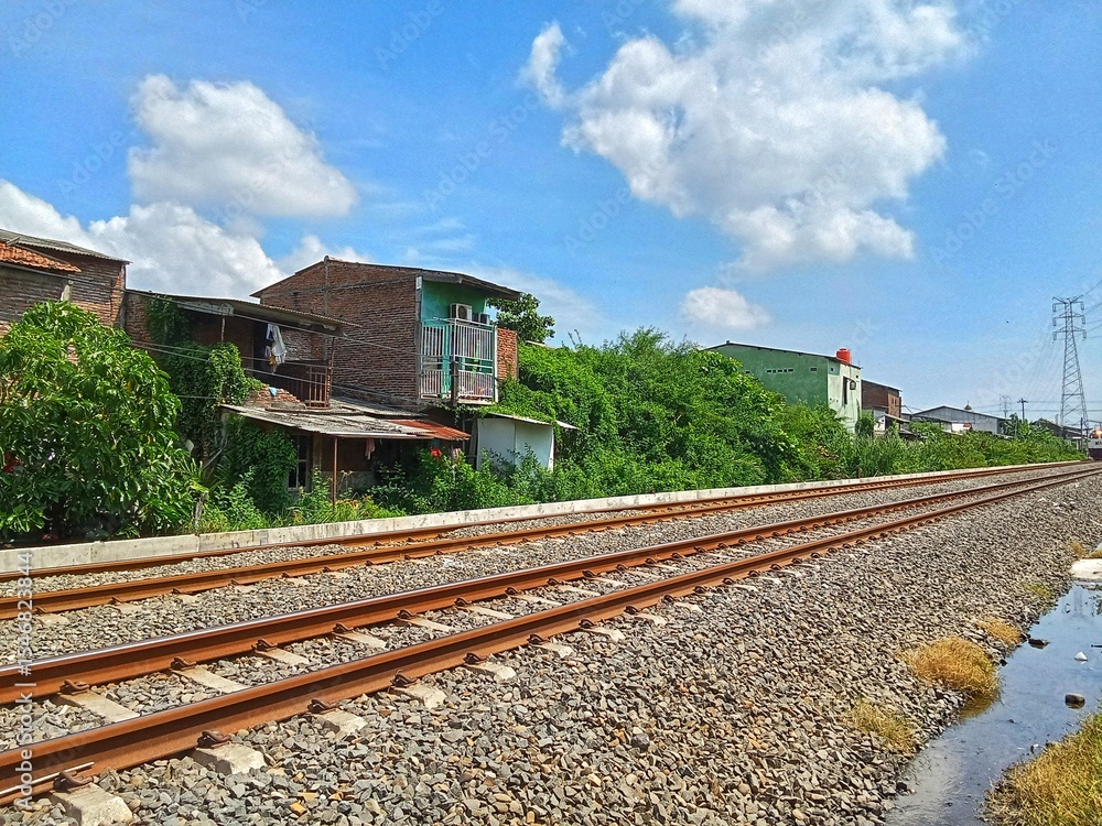 Fototapeta premium A rail road with beautiful blue sky views