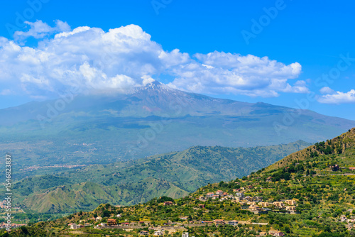 Smoke rising from Mount Etna’s peak early in the morning