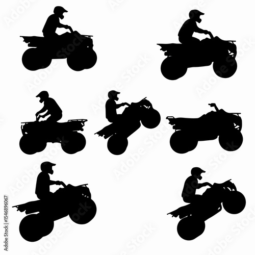 Silhouette of atv rider performing stunt driving