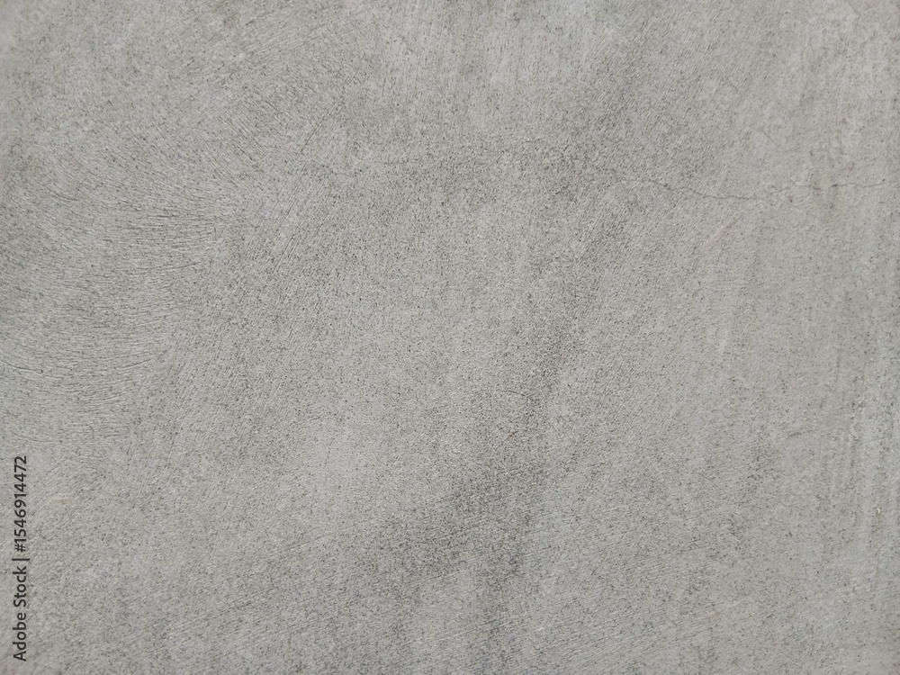 Fototapeta premium Abstract background of smooth textured cement floor surface close up.
