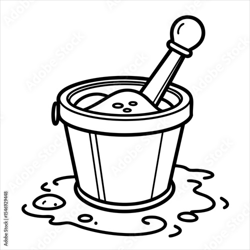 A bucket filled with sand and a shovel surrounded by spilled sand