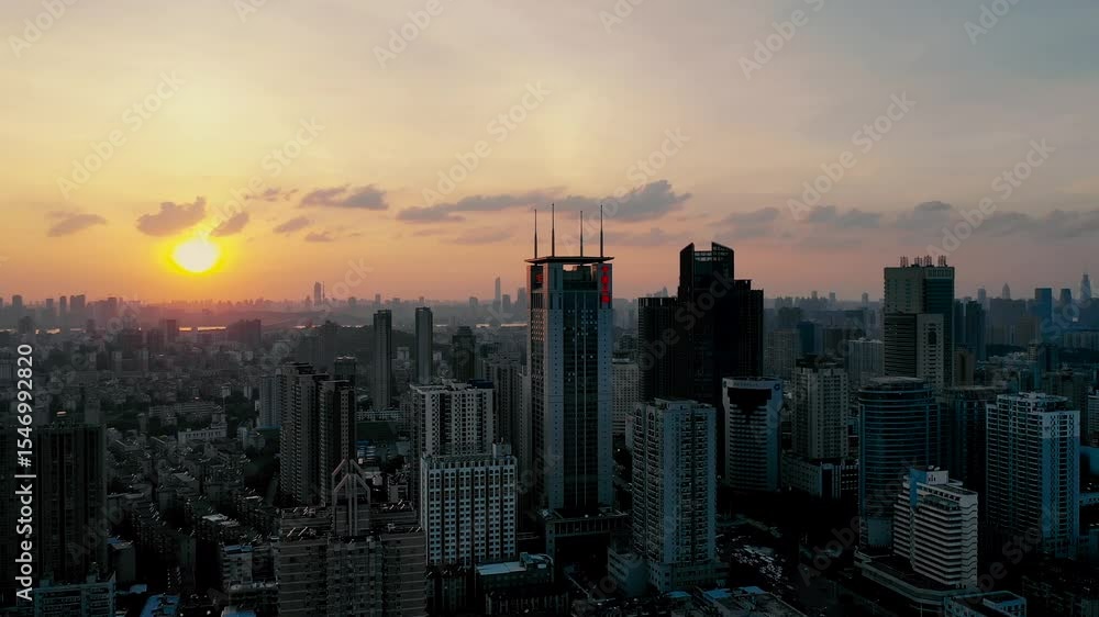 Stunning cityscape view at sunset showcasing skyscrapers and vibrant skyline in an urban area Stunning cityscape view at sunset showcasing skyscrapers and vibrant skyline in an urban area