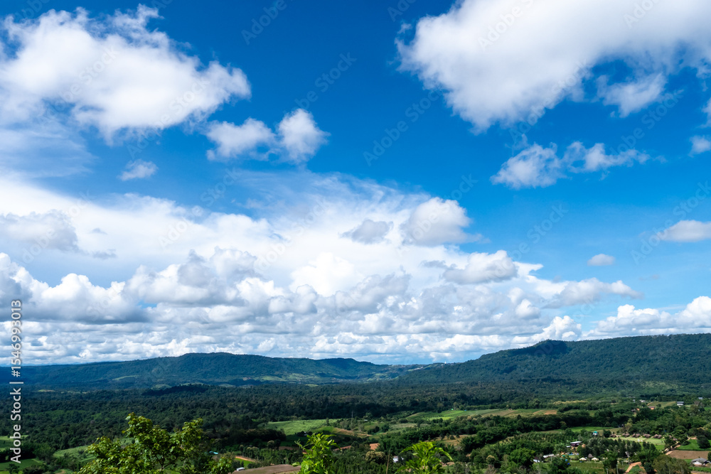 Obraz premium Amazing landscape fog mountain clouds scenery. Beautiful Mountain landscape foggy windy mountain range green landscape asian farm. Landscape mountain green field meadow white cloud blue sky sunrise