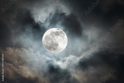 Wallpaper Mural a full moon is seen through the clouds Torontodigital.ca