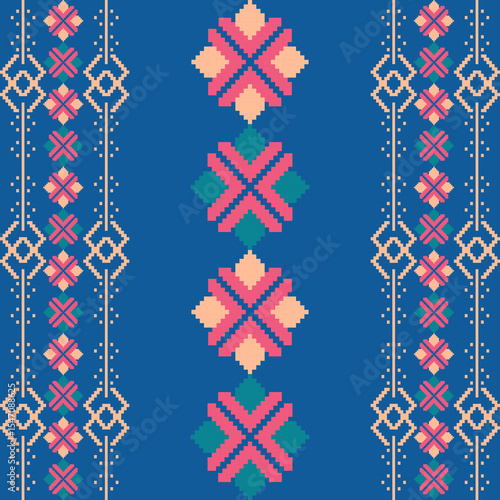 Red and green cross-stitch abstract on a blue background, ethnic boho seamless pattern. Patchwork texture. Weaving. Traditional ornament. Tribal pattern. Vyshyvanka. Pixel art.