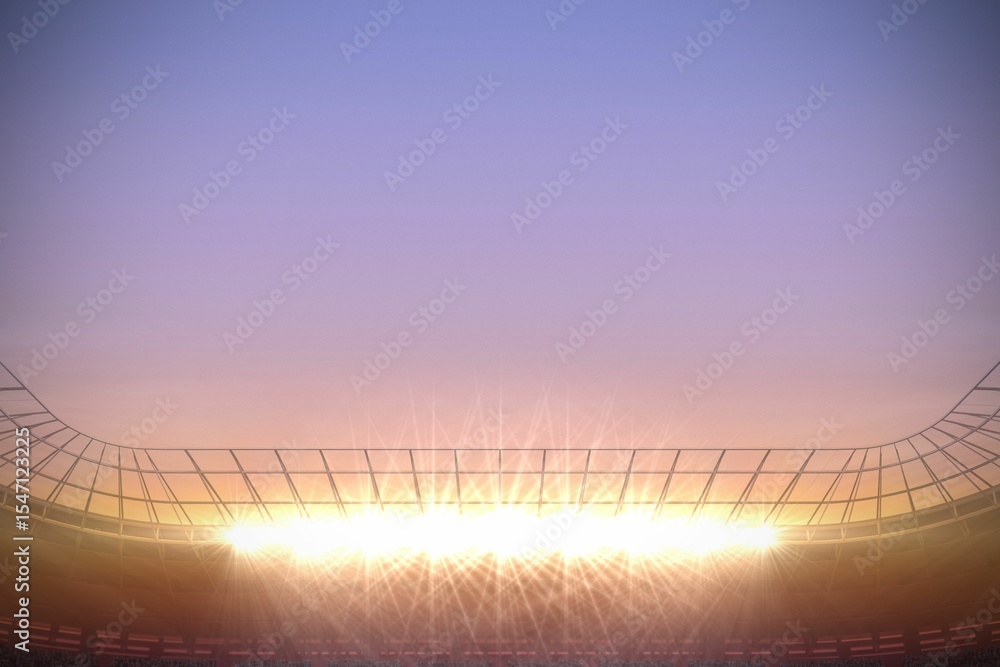 Obraz premium Large football stadium with spotlights at sunrise
