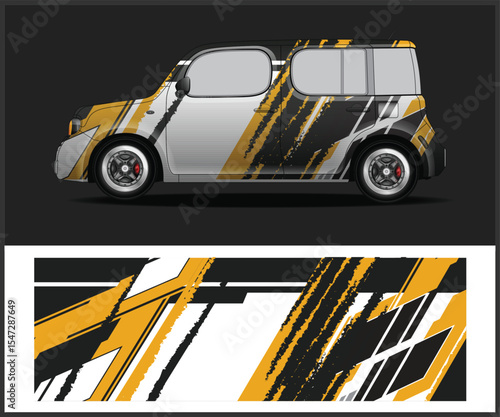 Car Wrap Design with Abstract Yellow and Black Graphics on a Cube Car
