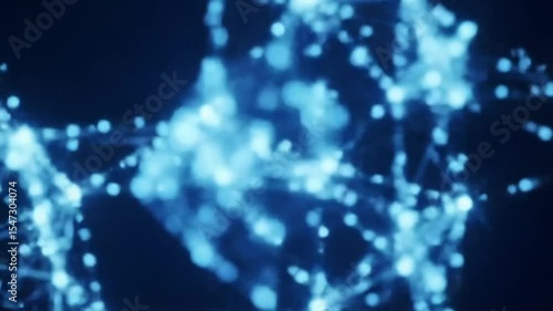 Abstract digital animation of glowing blue particles floating in dark space, perfect for background or futuristic themes.