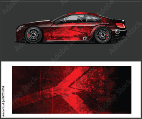 Sleek Red Sports Car with Abstract Graphic Wrap Design on Dark Background