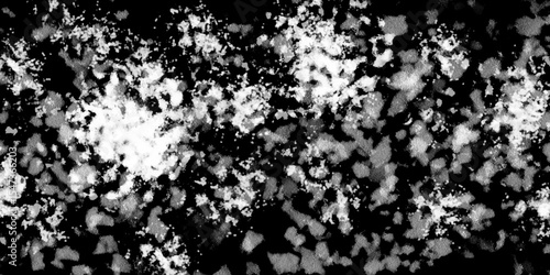 Snowflakes on dark background. white icy snowflakes isolated on black background, natural background. white crystalline powder on a black background. sugar dust. texture, pattern and clipping.