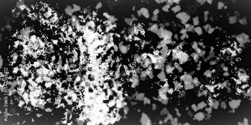 Snowflakes on dark background. white icy snowflakes isolated on black background, natural background. white crystalline powder on a black background. sugar dust. texture, pattern and clipping.