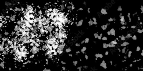 Snowflakes on dark background. white icy snowflakes isolated on black background, natural background. white crystalline powder on a black background. sugar dust. texture, pattern and clipping.