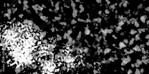 Snowflakes on dark background. white icy snowflakes isolated on black background, natural background. white crystalline powder on a black background. sugar dust. texture, pattern and clipping.