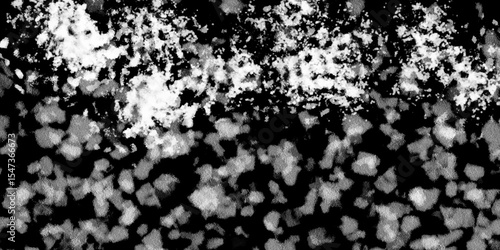 Snowflakes on dark background. white icy snowflakes isolated on black background, natural background. white crystalline powder on a black background. sugar dust. texture, pattern and clipping.