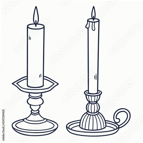 Elegant candlestick holders with burning candles, isolated
