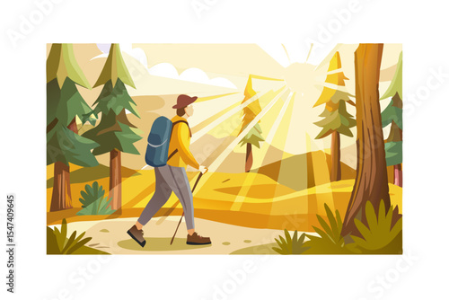 Hiker walking on sunny trail in autumn forest