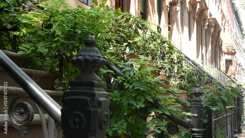 New York City townhouse building, Brooklyn Heights residential district, USA. Brownstone urban architecture, attached house. United States real estate, american property, apartments and homes in NYC.