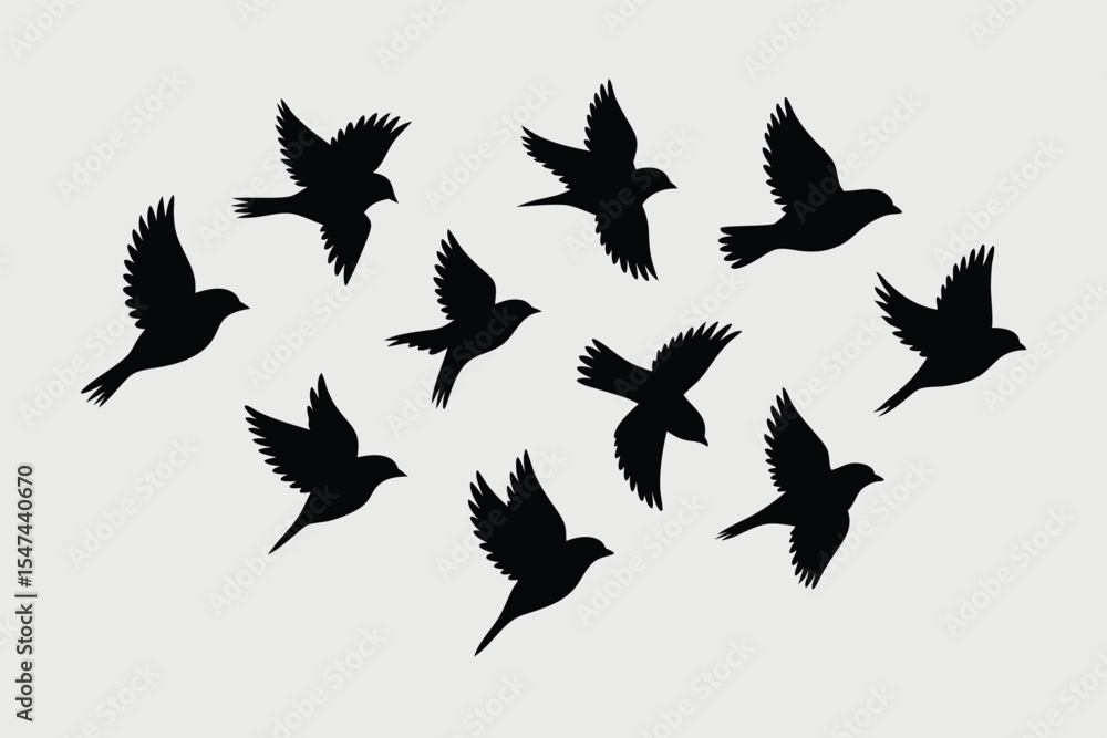 Fototapeta premium Silhouette of Eleven Birds Flying, Wings Spread, Against a Light Gray Background, Design