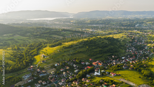 Fototapeta Naklejka Na Ścianę i Meble -  Widok z drona na Beskid Żywiecki i miejscowość Trzebinia oraz jezioro Żywieckie.