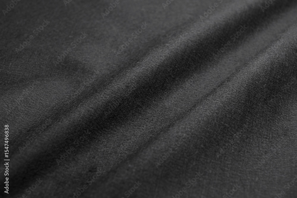 Fototapeta premium Black Felt Drape Fabric with Natural Wave Pattern