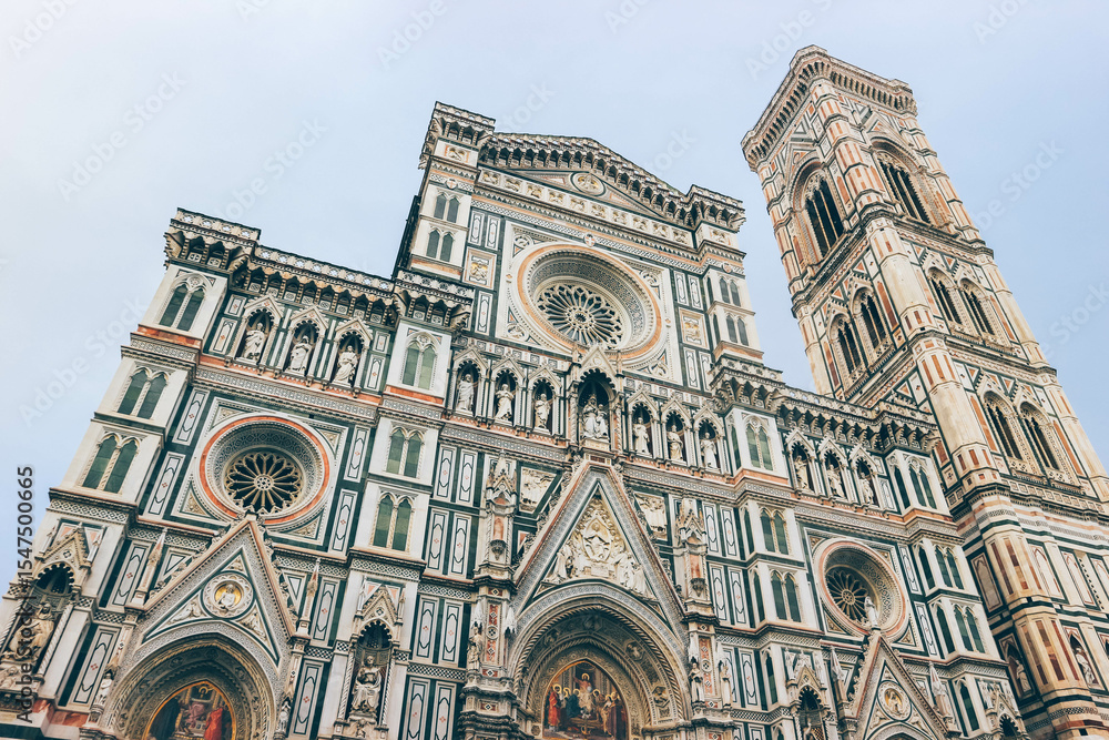 Fototapeta premium facade of the cathedral of florence from bottom with renaissance details architecture