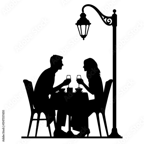 Silhouette of couple dining under streetlamp, romantic evening ambiance