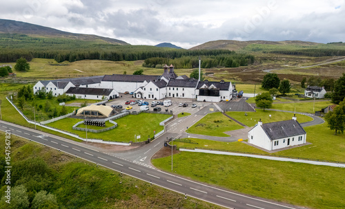 Aerial drone shot of Dalwhinnie distillery, whisky manufacturer, Scotland 