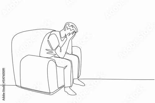 Single one line drawing a man sitting on a single sofa covering face with both palms. Tests of life come one after another. National Anxiety Screening Day. Continuous line design graphic illustration